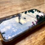 High angle view of cloudy sky seen through glass on table